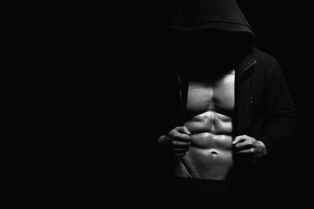 Mann mit Sixpack